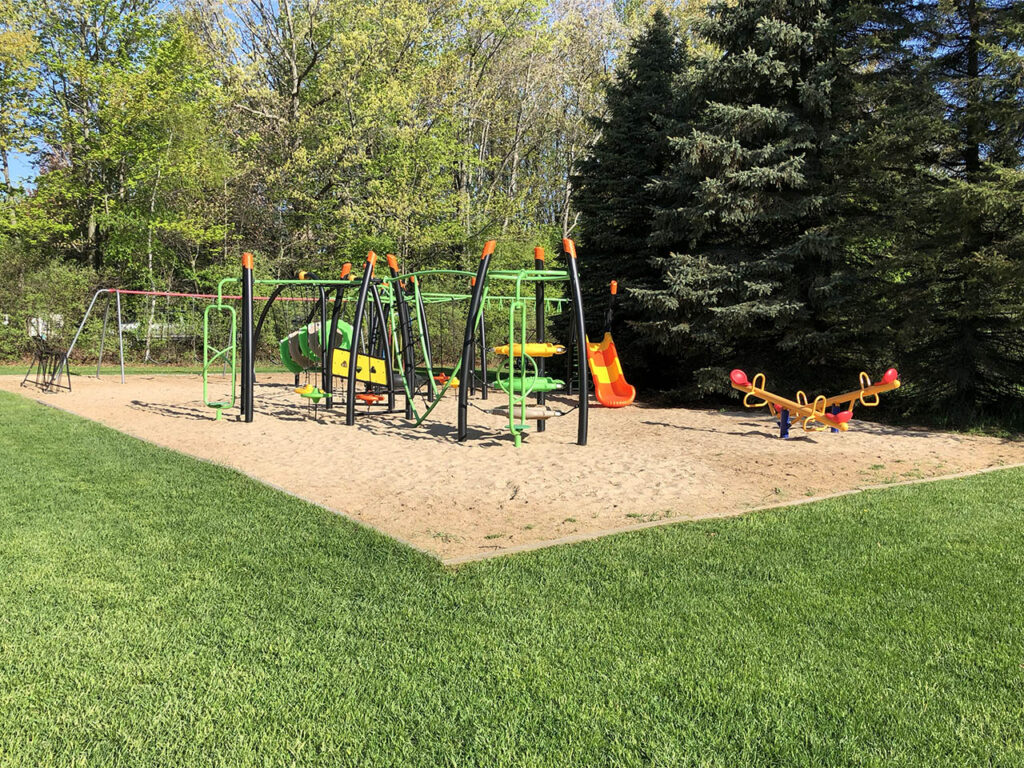 Picture of playground with swings and jungle gyms